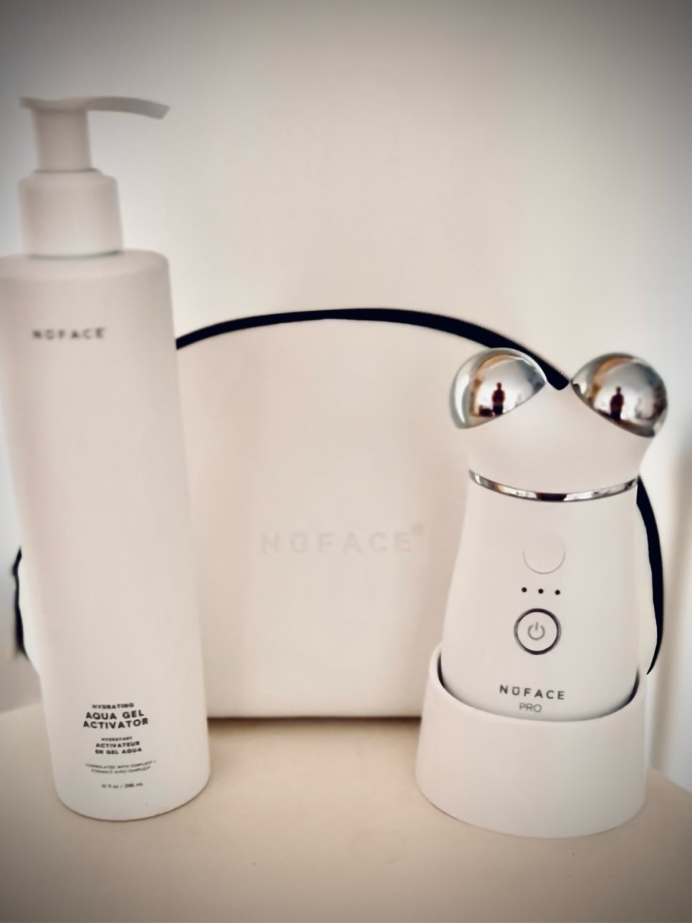 NuFACE Pro Device with White Bag, Gel Activator, Brush & Power cradle.